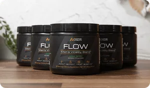 Six jars of FLOW Men's Vitality Blend